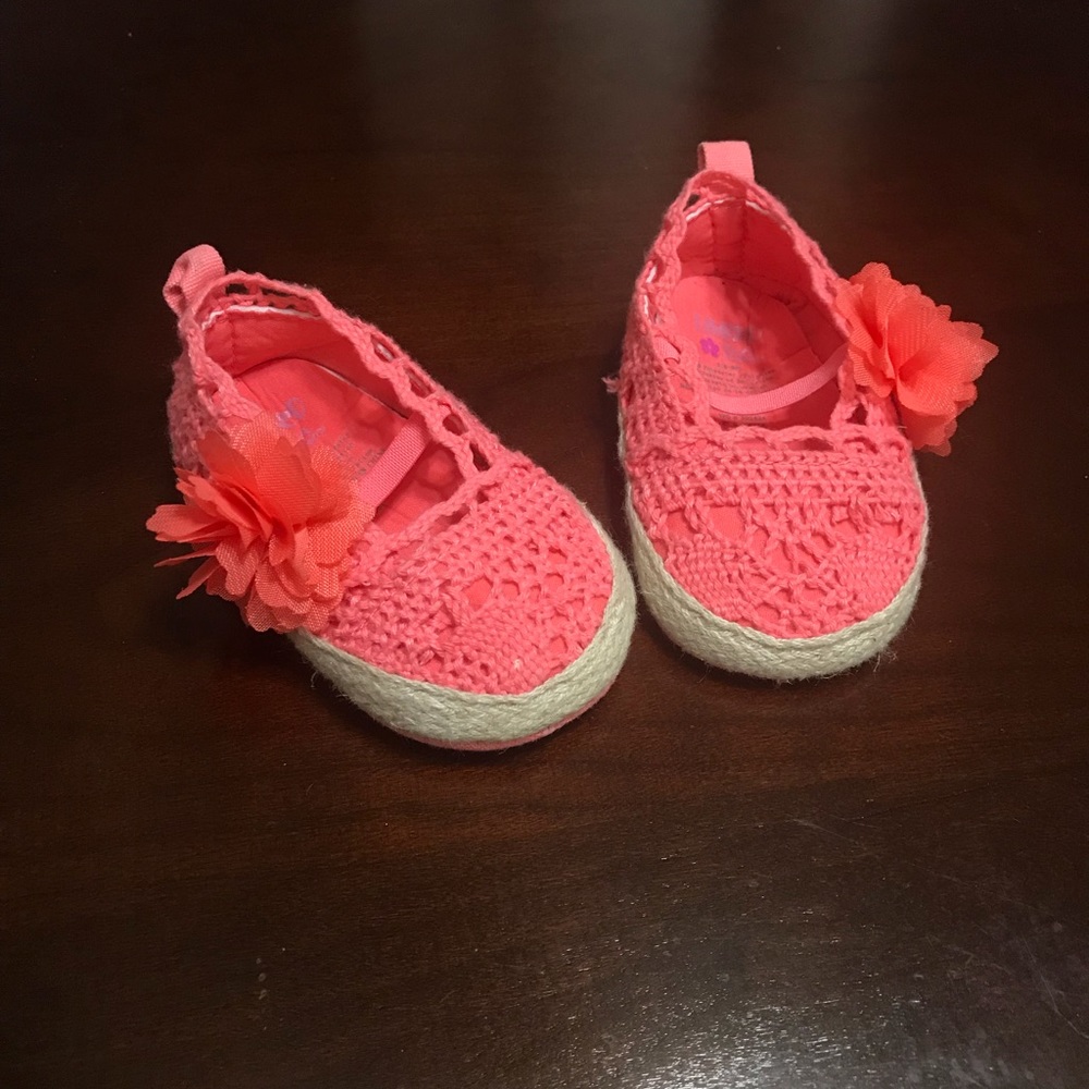 14 pairs of baby girl shoes.